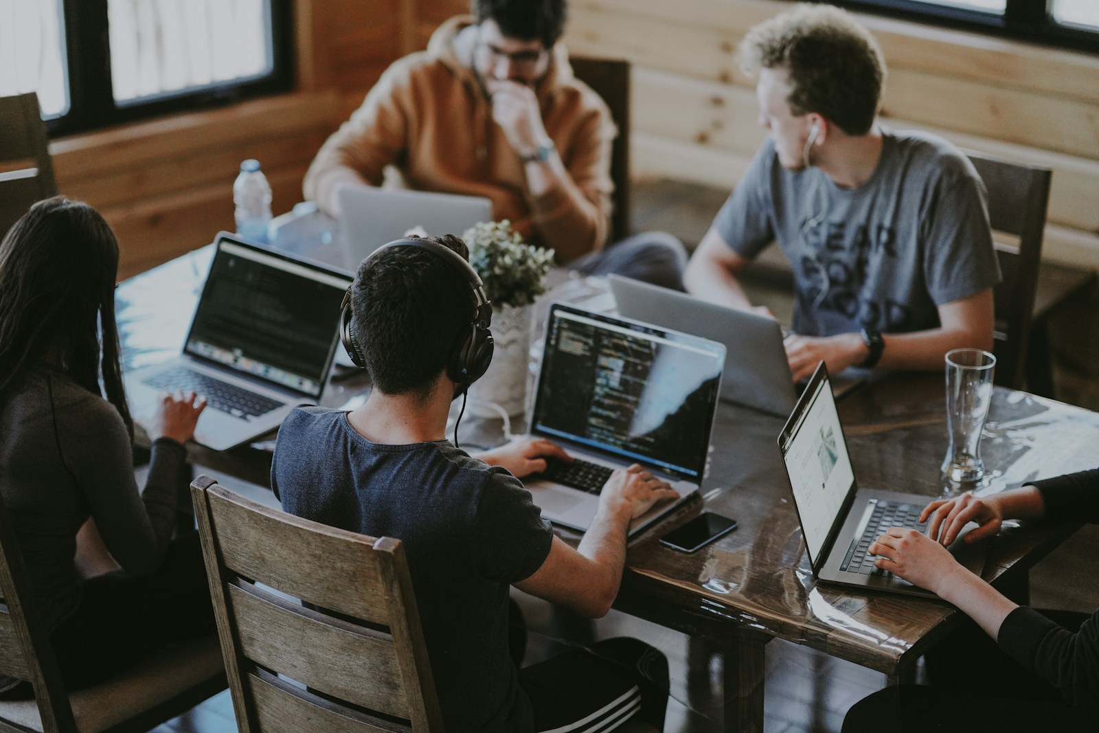 Engineers reviewing a knowledge-base build session at a shared desk